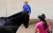 Monty Roberts teaching his unique horse training method.