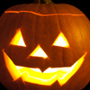 A well-lighted Jack-o-lantern symbolic of Halloween.