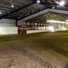 An indoor horse arena.