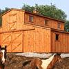 A new Horizon Structures horse barn on a well-designed site.