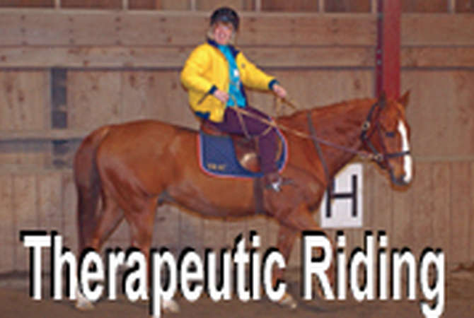 Rider on horse during therapeutic exercise.