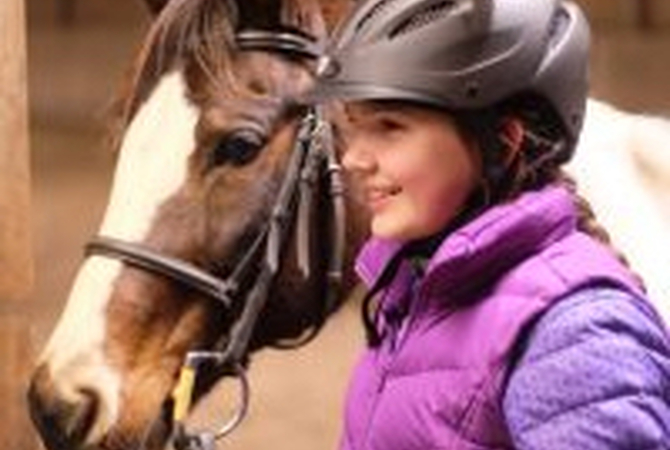 Student Lillian who took behavior course with her horse.