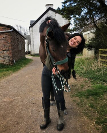 Cynthia Naydani in playful mood with her horse.