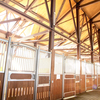 Dramatic view of barn interior with skylights and special interior design.