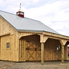 Horizon Structures modular horse barn with overhang.