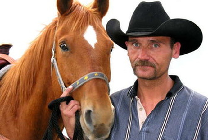 Veteran in need of equine assisted therapy with horse.