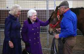 Monty Roberts with Queen Elizabeth and one of her horses.