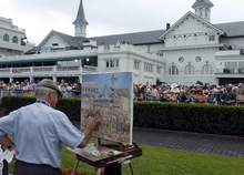 Painter painting Churchill Downs