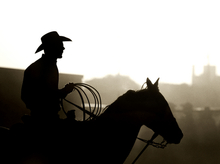 A cowboy roping champion